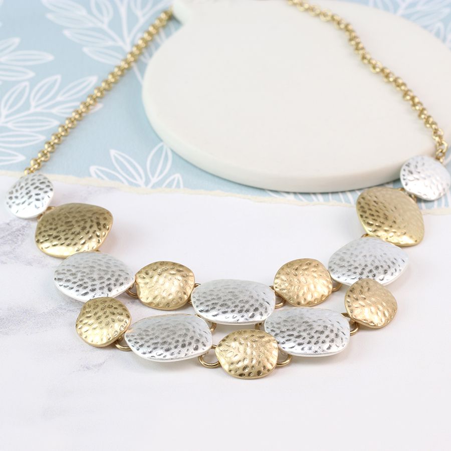 silver and gold plated necklace.