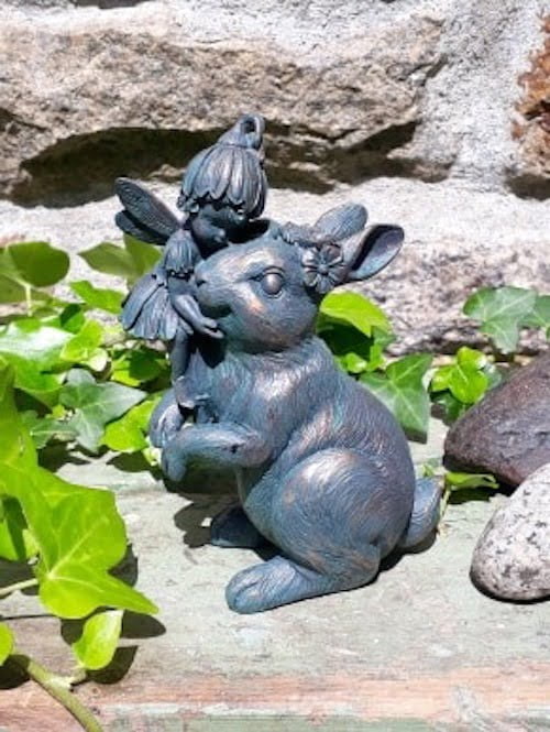 100929457_274330173719196_2661152102989955072_n Ornament of a flower fairy cuddling a rabbit