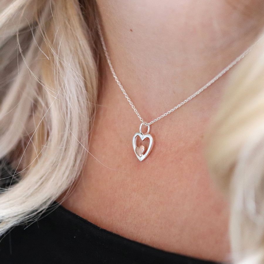 Silver Sterling Heart Necklace . With small gold plated heart