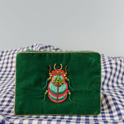 Small green velvet purse with hand embroidered beetle