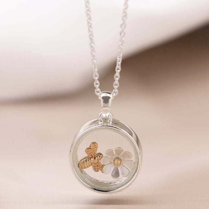 Silver plated circle necklace with golden bee and flower