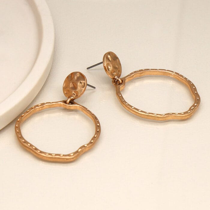 Golden hammered disc and hoop earrings