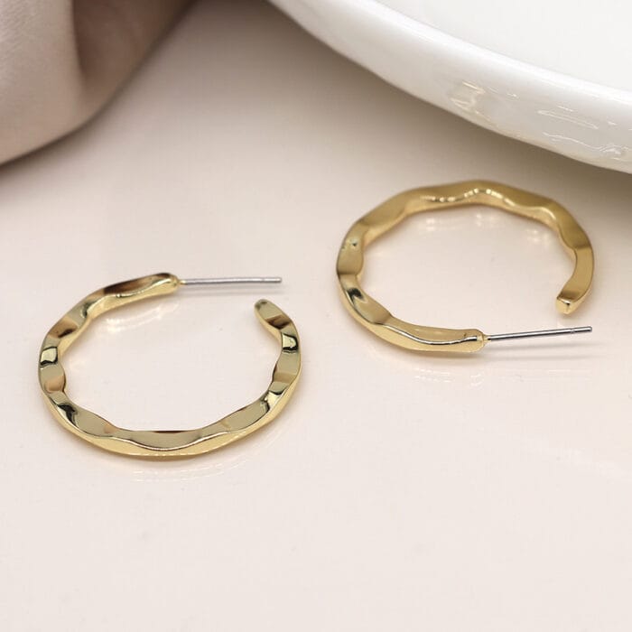 Golden irregular hoop earrings