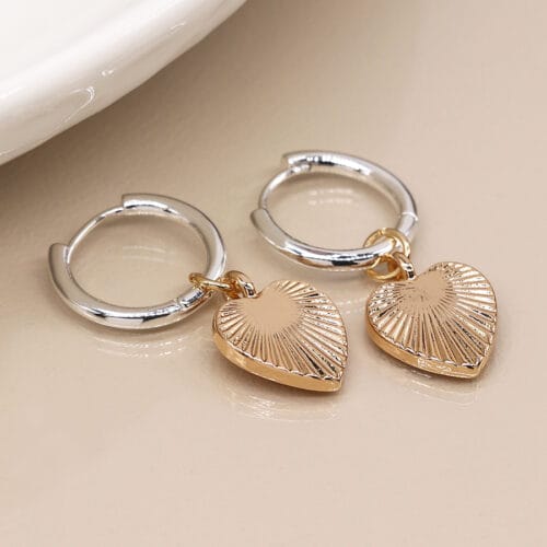 Silver plated hoop and golden embossed heart earrings