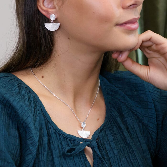 Silver plated disc and half moon necklace